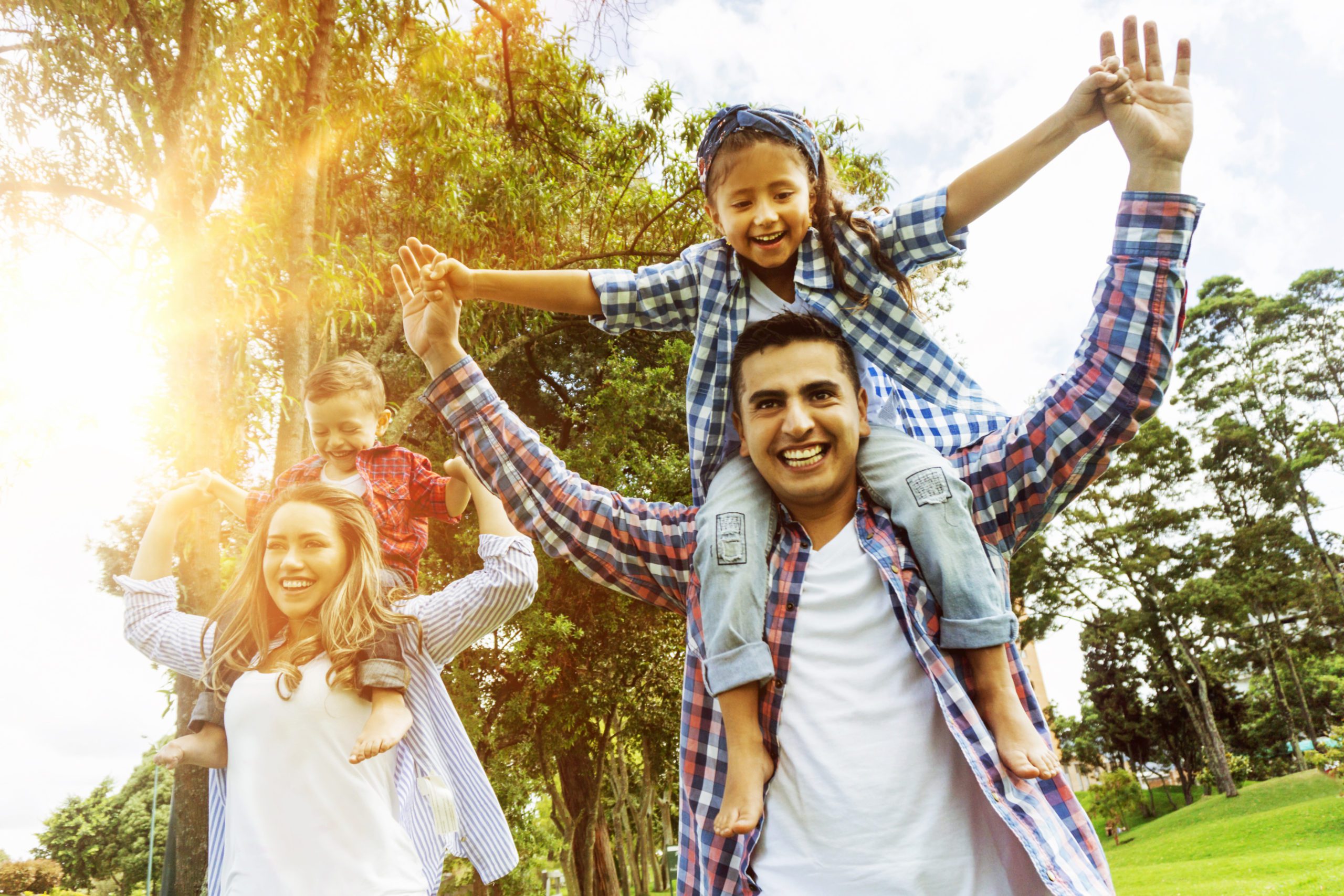 Happy family having fun at the park